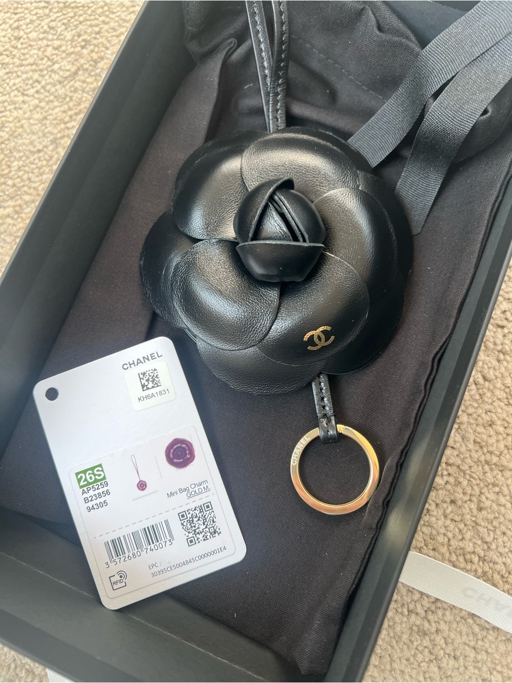 Chanel 26S camellia black leather bag charm